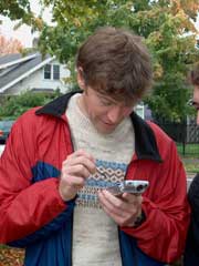 A student recording some neighborhood asset information directly into a GIS-enabled PDA.  This device also had a digitial camera insert, so that digital images could be embedded into the GIS database.