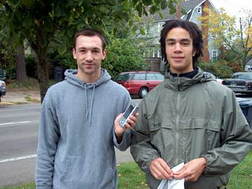 Eric (left), a student in the GIS class, and Dan (right) from the neighborhood, collect neighbrohood asset data with a GIS-enabled PDA.