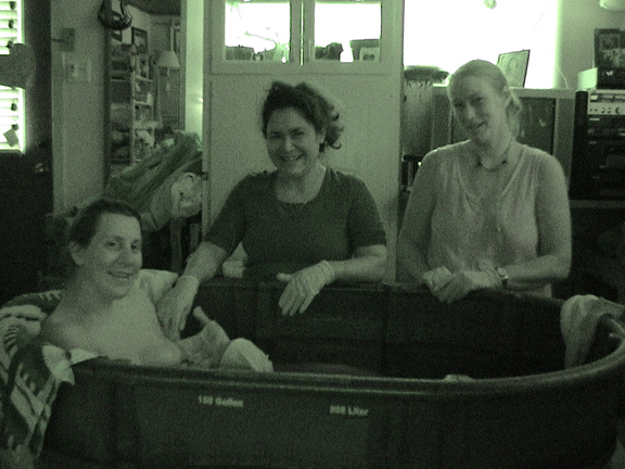 Midwives Anita and 
Cory with Anna and babe