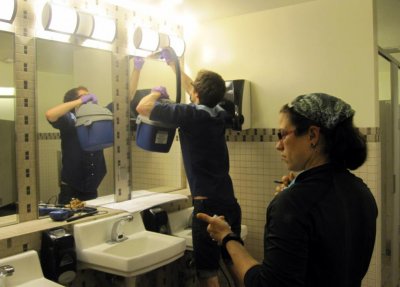 Tim O'Connor and Gwynne Mhuireach gather samples in Lillis restroom