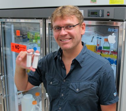 Hans Dreyer with vials of essential amino acids