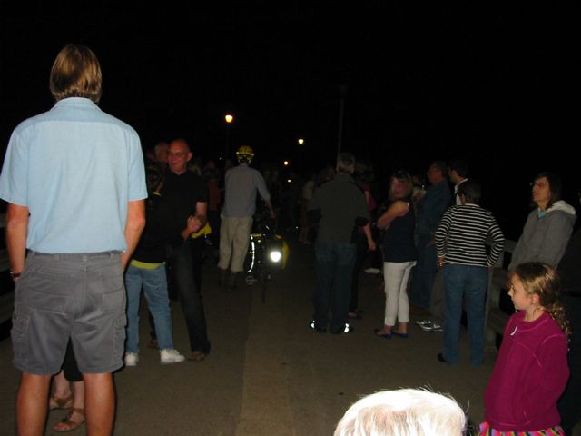 A bicyclist carefully walking his bike through the dancers (thank you!)