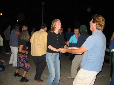 8:31PM: Ellen & Gary, Ken & Jane, and tanguera Vicky and Alan all dancing Zydeco