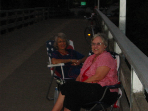 two spectators, seated