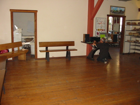 Scott fine tuning his equipment. (We could use help moving the furniture)