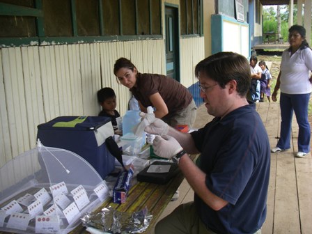 Josh: collecting blood spots for analyzing CRP, IgE, EBV etc. Photo Sugiyama 2008.